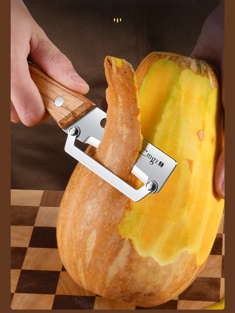 Stainless steel peeler with wooden handle for peeling and slicing fruits and vegetables